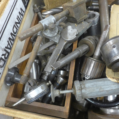 5036 - A box of assorted lathe parts including chucks, boars, extenders, drill bits, etc.