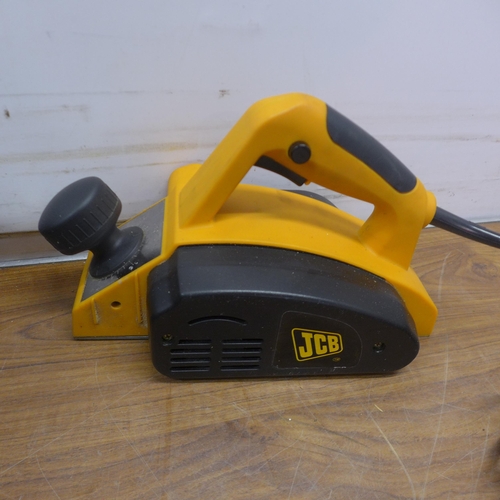 5042 - A cased JCB 240v handheld planer with 84mm width blade