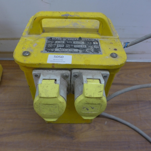 5050 - A 2 socket 110V transformer, a roll of  approximately 30m of 110V extension cable and a 110V lamp
(*... 