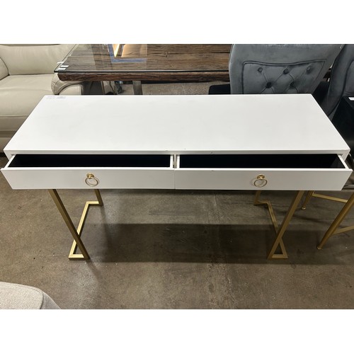 3082 - A white two drawer console table with gold legs