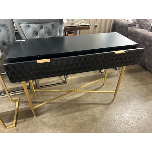 3083 - A black single drawer console table with gold legs