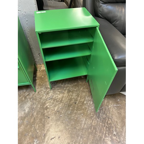 3174 - A green industrial style metal cabinet