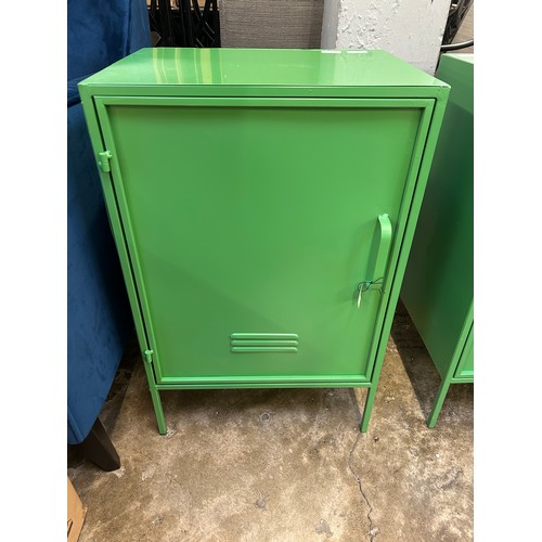 3175 - A green industrial style metal cabinet