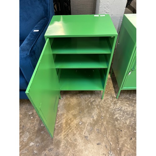 3175 - A green industrial style metal cabinet