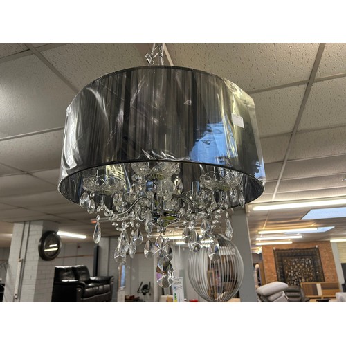 3180 - A chrome five arm chandelier with black shade