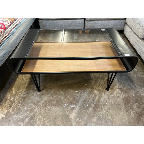 3182 - A glass topped coffee table