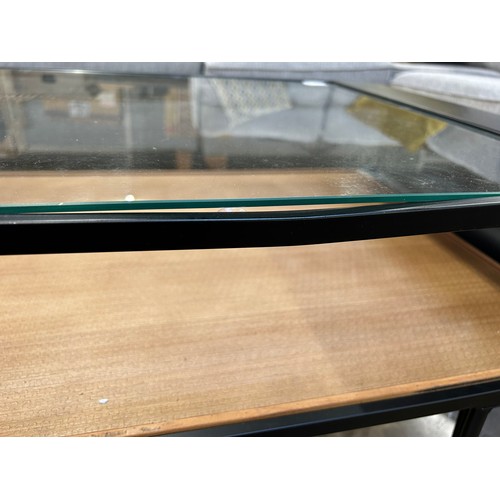 3182 - A glass topped coffee table