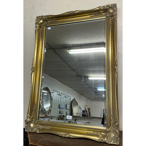 317 - A Victorian style gilt framed mirror