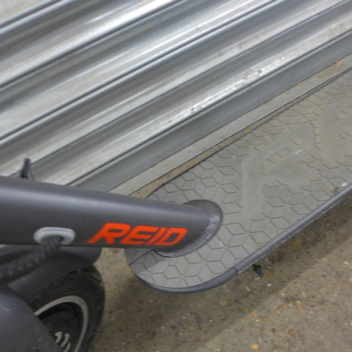 5173 - A Reid adult sized folding electric scooter