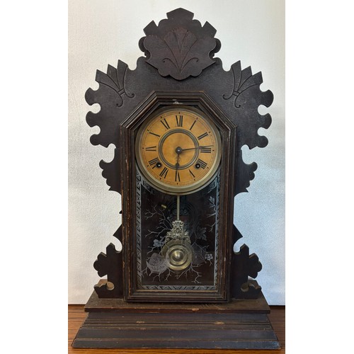 306E - A late 19th Century American carved beech shelf clock and a wall clock