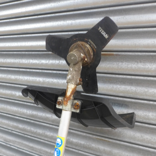 5196 - A Titan TTL530 GBC petrol driven brush cutter * Police repossession