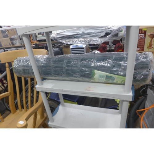 5221 - A 4 tier plastic shelf unit and a roll of Simpa fencing