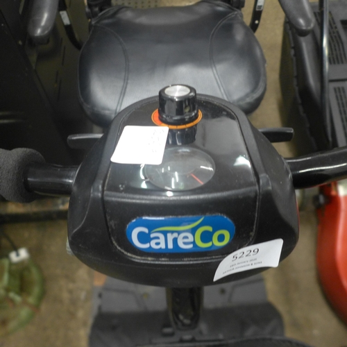 5229 - A Care Co 4 wheel mobility scooter with key and charger