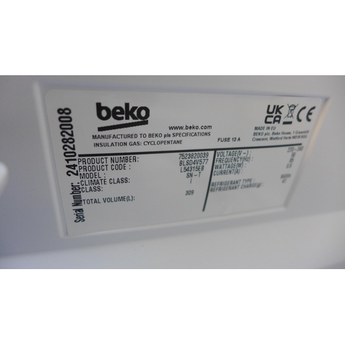 4162 - Beko  Integrated Tower Fridge (Transit Damage) *This lot is subject to VAT