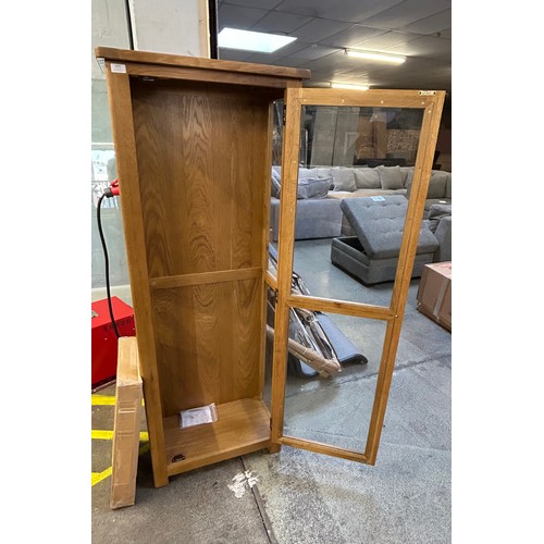 3222 - An oak display cabinet