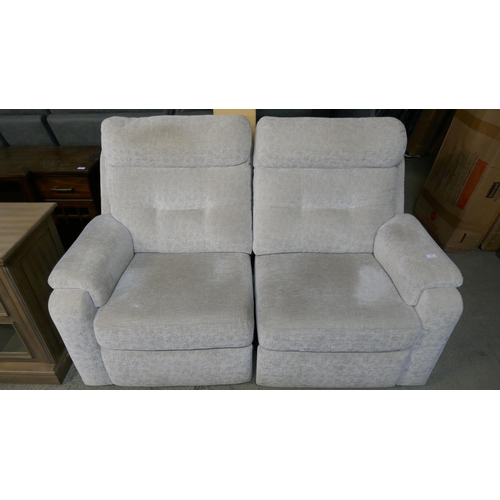 3228 - A beige two seater electric reclining sofa