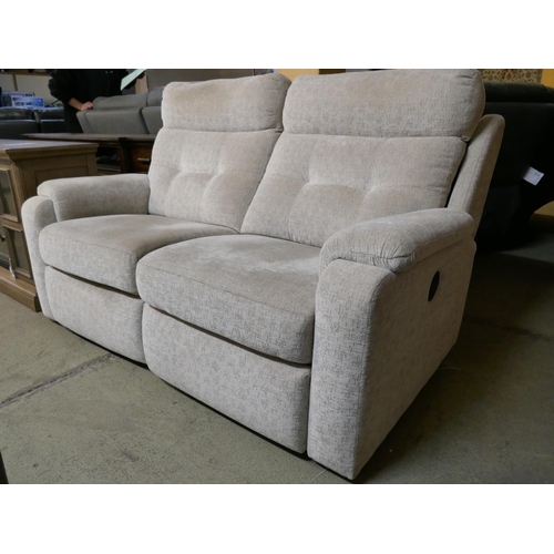 3228 - A beige two seater electric reclining sofa