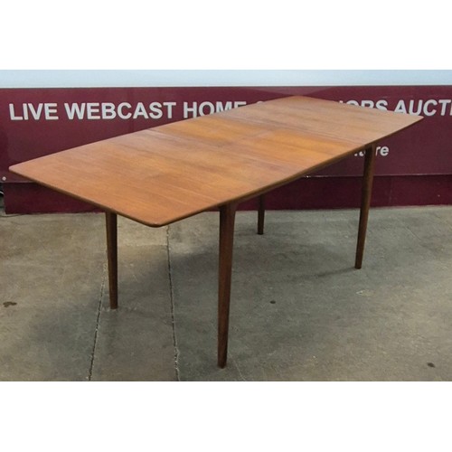 5 - A McIntosh teak extending T2 model dining table and four chairs