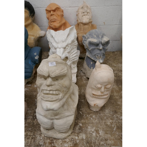 5406 - 12 busts featuring miscellaneous characters including cyclops, a gargoyle, a wolf, a mutant etc.