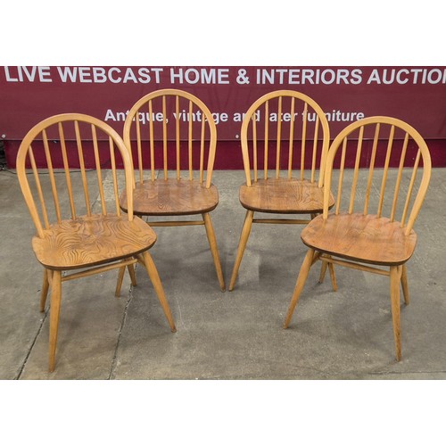 13 - A set of four Ercol Blonde elm and beech Windsor chairs