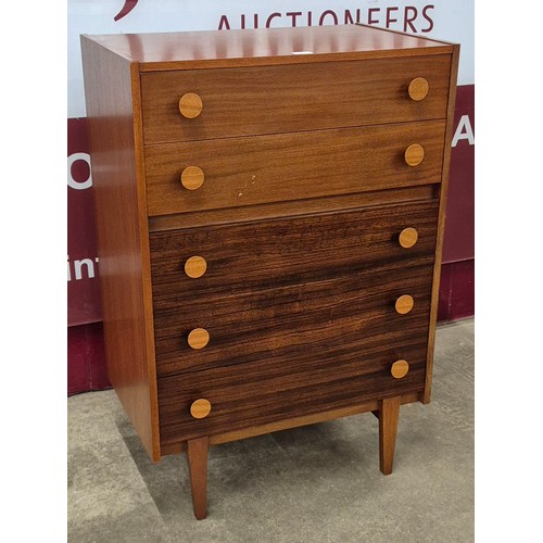 22 - A teak and afromosia chest of drawers