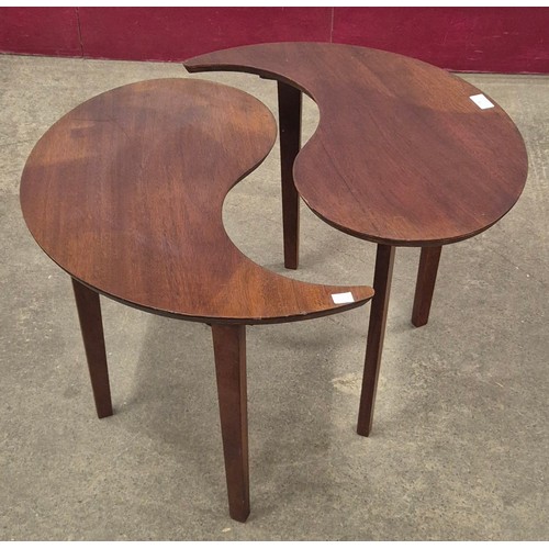 28 - A teak two piece circular puzzle coffee table