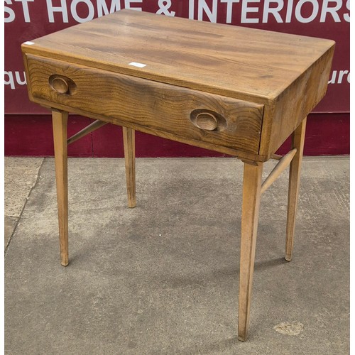 40 - An Ercol Blonde elm and beech 437 model desk