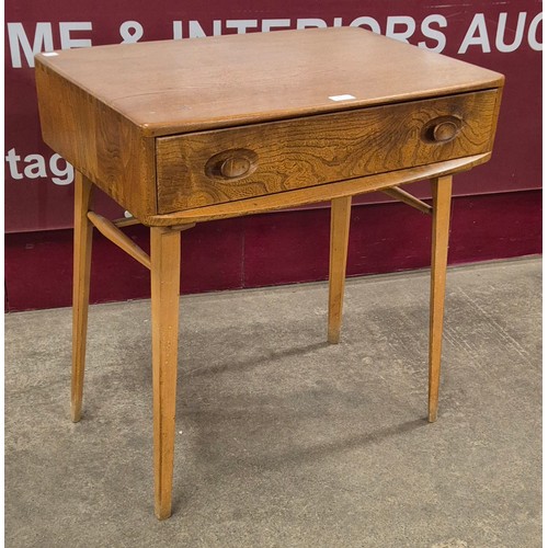 39 - An Ercol Blonde elm and beech 437 model desk