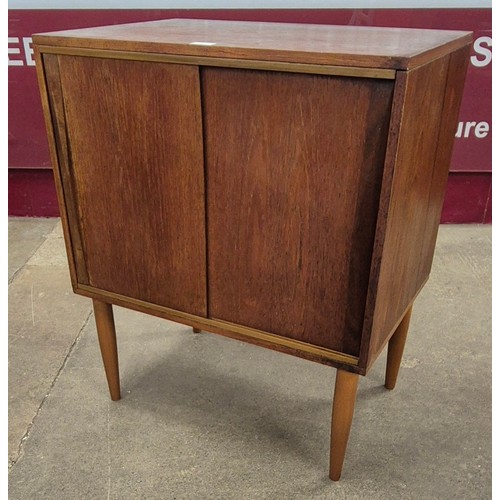 45 - A teak two door cabinet