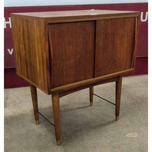 44 - A teak two door cabinet