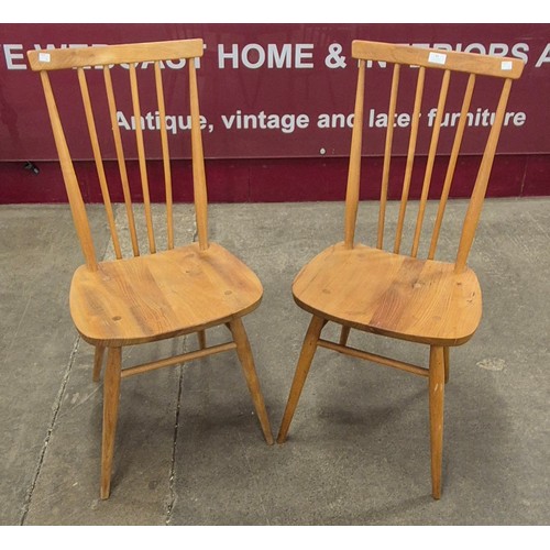 43 - A pair of Ercol Blonde elm and beech 608 model chairs