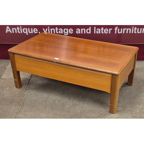 55 - A Nathan teak metamorphic coffee table