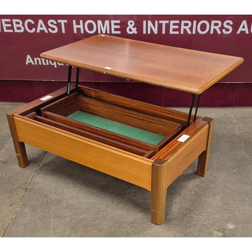 55 - A Nathan teak metamorphic coffee table