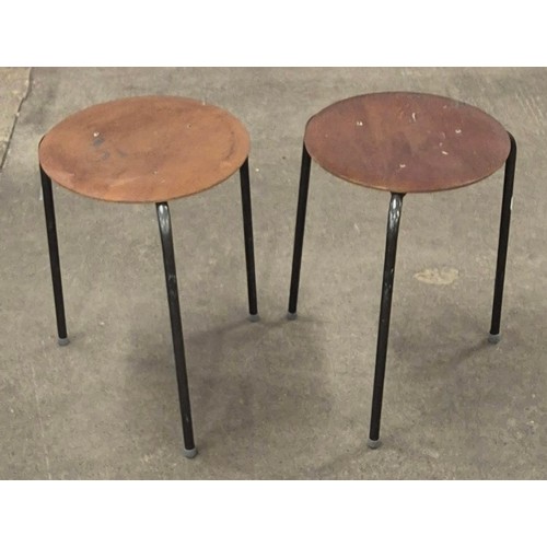 51 - A pair of Arne Jacobsen plywood and black metal Dot stools