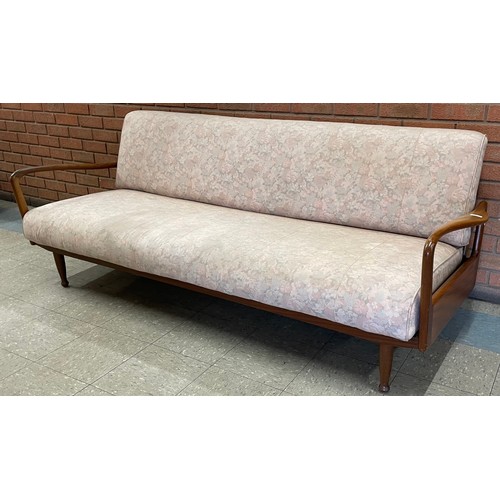 59 - A Greaves & Thomas teak and fabric upholstered three piece lounge suite, comprising; daybed and two ... 