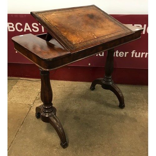 110 - A Victorian mahogany and leather topped adjustable writing table