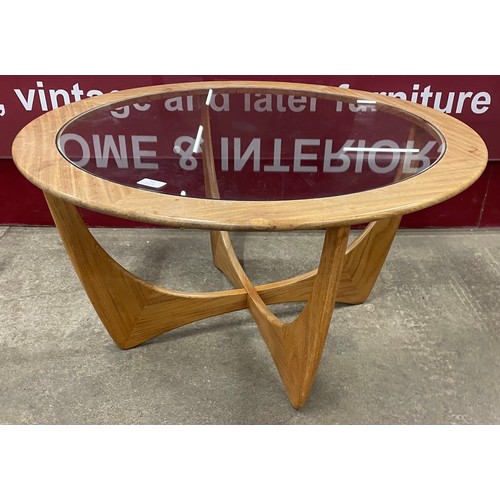 63 - A G-Plan Astro circular teak and glass topped coffee table