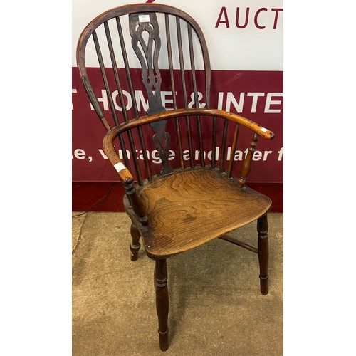 175 - A 19th Century elm yew and beech Windsor highback armchair