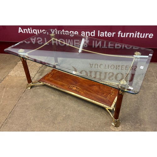 185 - An Italian Hollywood Regency gilt metal and faux walnut coffee table