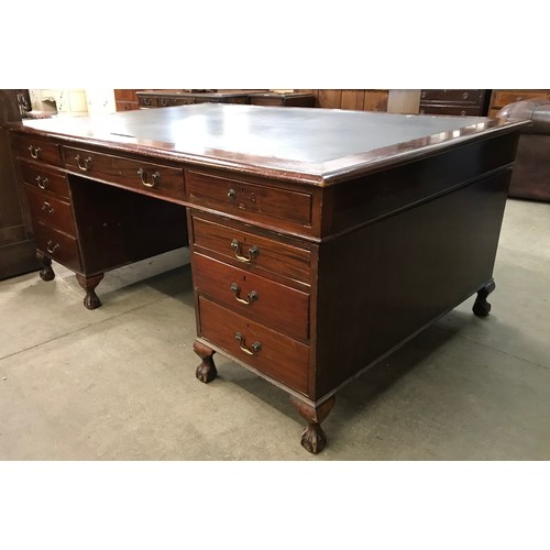 211 - A large Edward VII mahogany and green leather topped partners desk