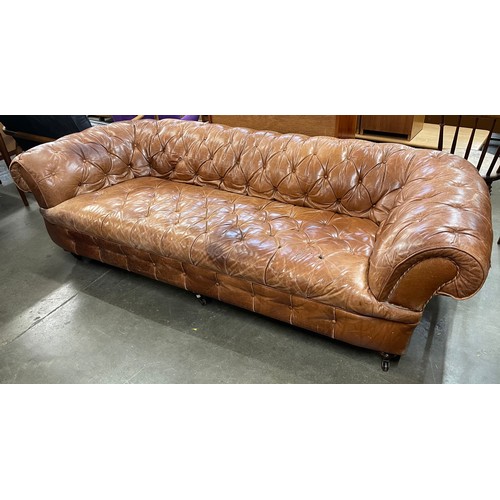 213 - A Victorian style brown leather Chesterfield settee