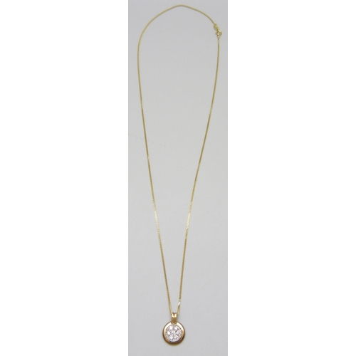 7002 - A 9ct gold and diamond set pendant on a 9ct gold chain, 3.9g total, 1.7cm pendant