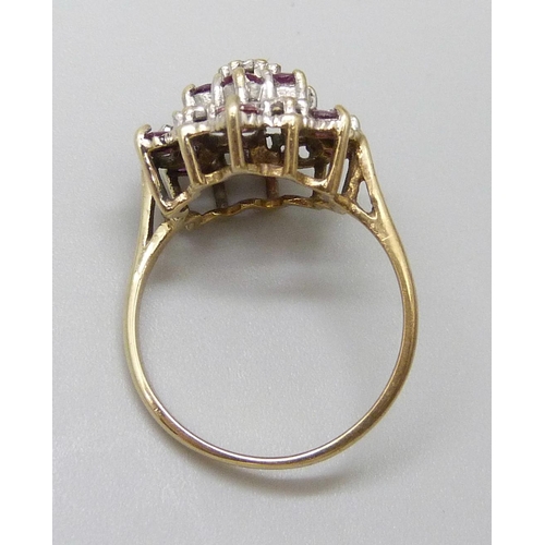 7012 - A 9ct gold, ruby and diamond cocktail ring, 3.2g, O