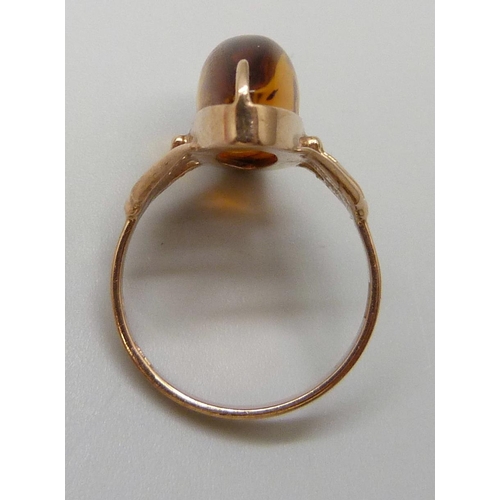 7028 - A Russian .583 gold amber set ring, 4g, O/P