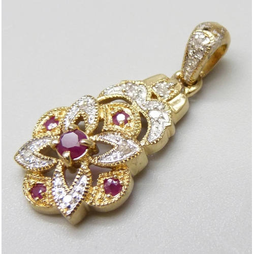 7035 - A 9ct gold, diamond and ruby pendant, 2.3g, 2.5cm