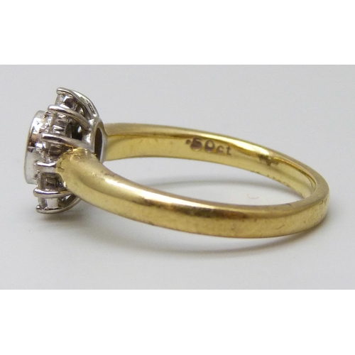 7041 - A yellow metal diamond cluster ring, 0.5ct diamond weight stamped in shank, with control marks, 5.5g... 