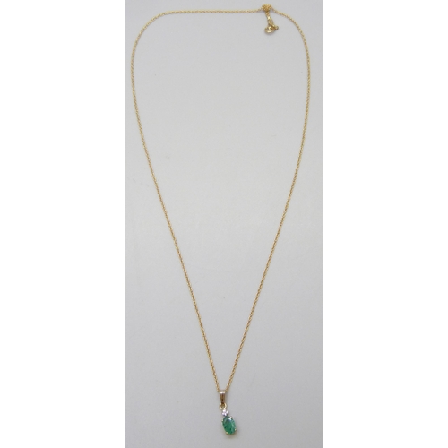 7051 - A 9ct gold, emerald and diamond pendant and chain, 1.2g, 1.4cm pendant