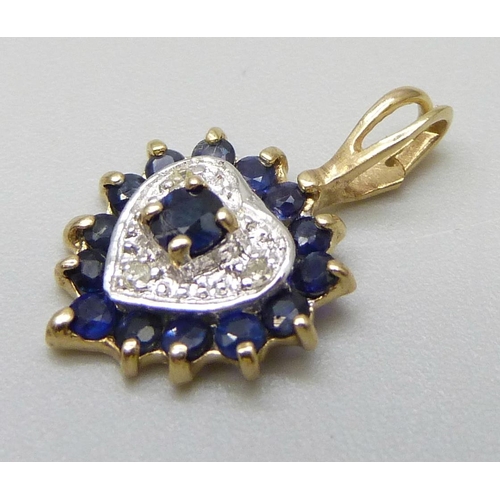 7056 - A 9ct gold, diamond and sapphire heart shaped cluster pendant, 0.8g, 1.6cm