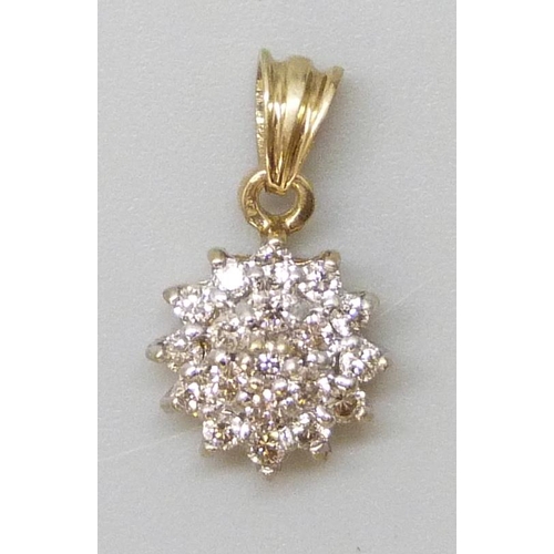 7061 - A yellow metal diamond set cluster pendant, 0.8g, 0.25ct marked verso, 1.4cm