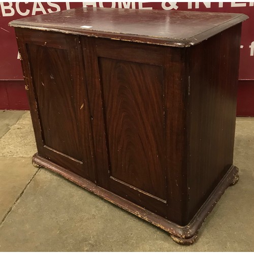 103 - A Victorian mahogany and stained pine fitted two door collectors cabinet